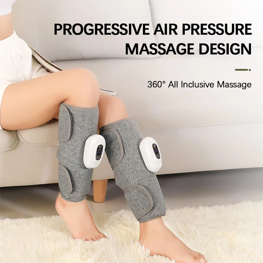 Manchons de compression sans fil gris portés sur les mollets