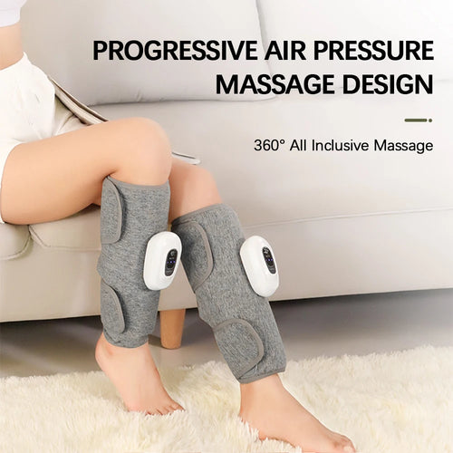 Manchons de compression sans fil gris portés sur les mollets