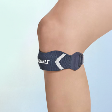 Strap genou rotulien réglable à coussinet